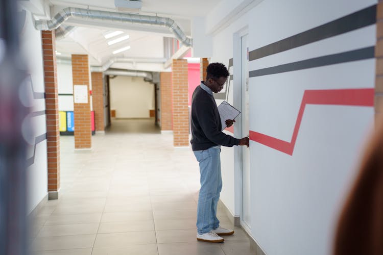 Man Opening A Door