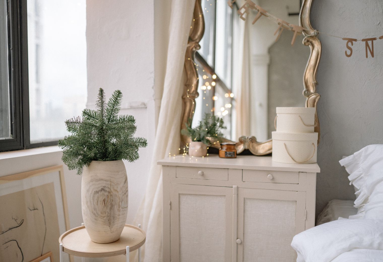 Wallpapering in Leamouth — a decorator at work mid-project