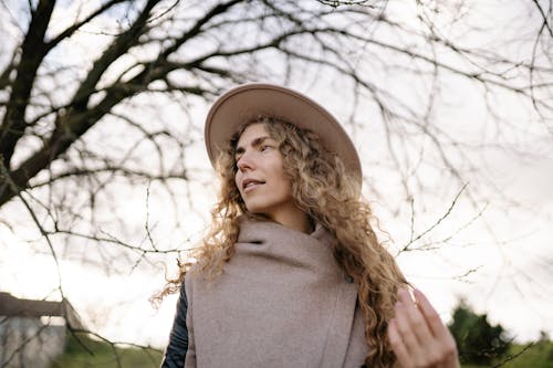 Portrait of Beautiful Woman on Autumn Day