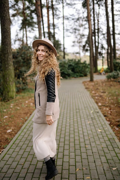 Portrait of Beautiful Woman on Autumn Day