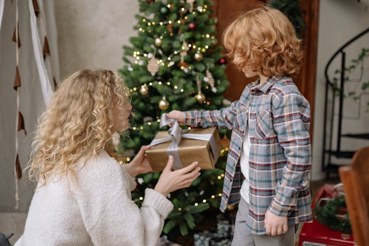 Little Boy Receiving Christmas Gift