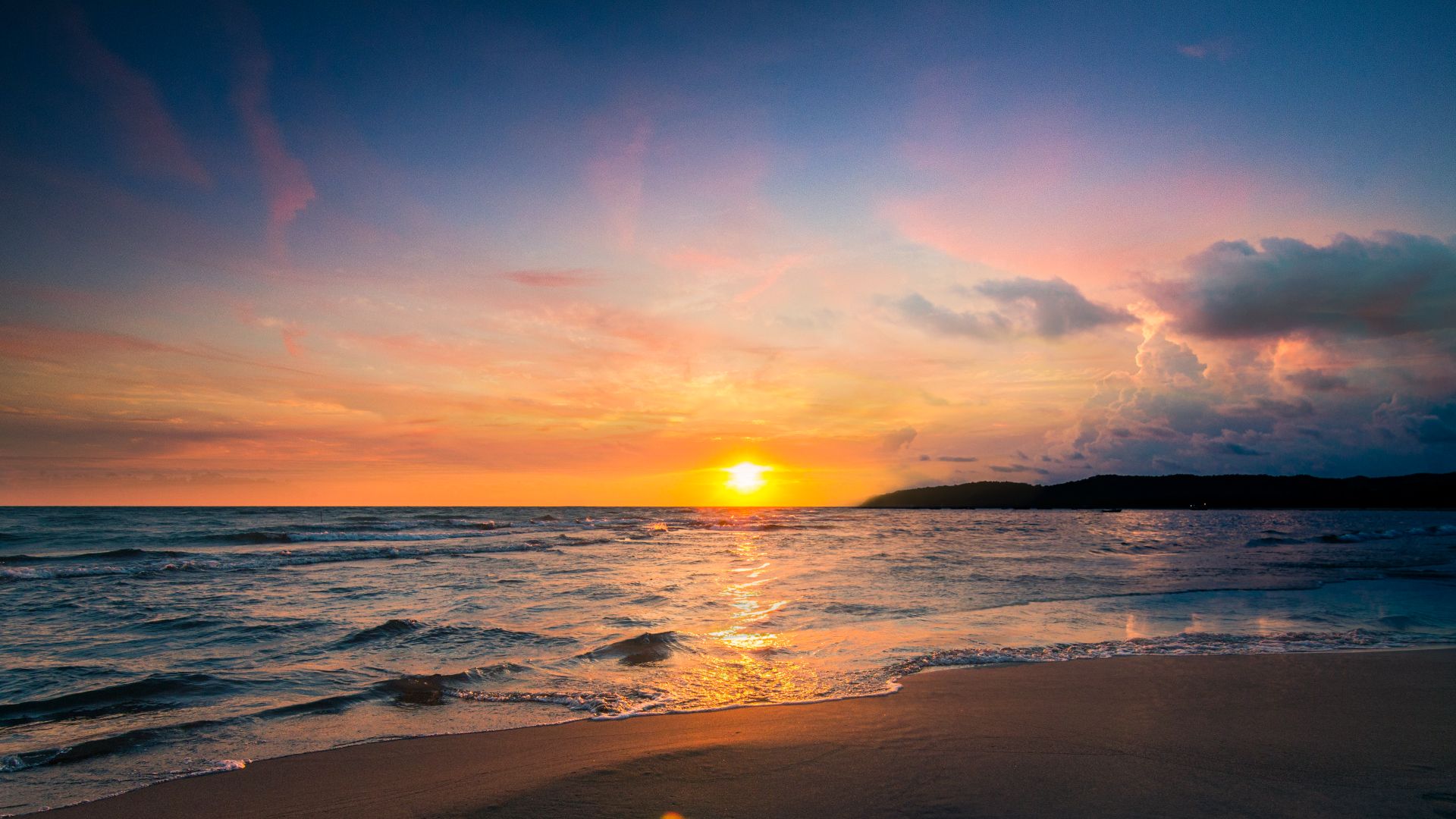 Golden hour over a calm Mediterranean sea