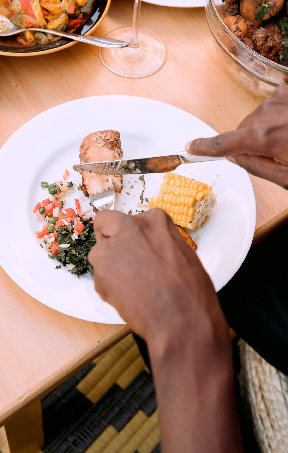 Eating African food in a restaurant