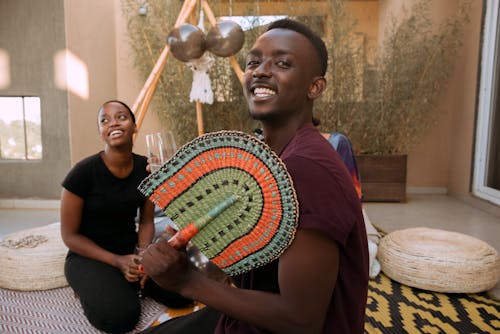 Kostenloses Stock Foto zu afrikanische frau, afrikanischer mann, fröhlich