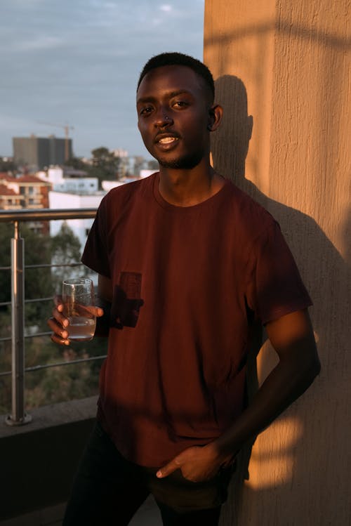 Man Holding a Drinking Glass