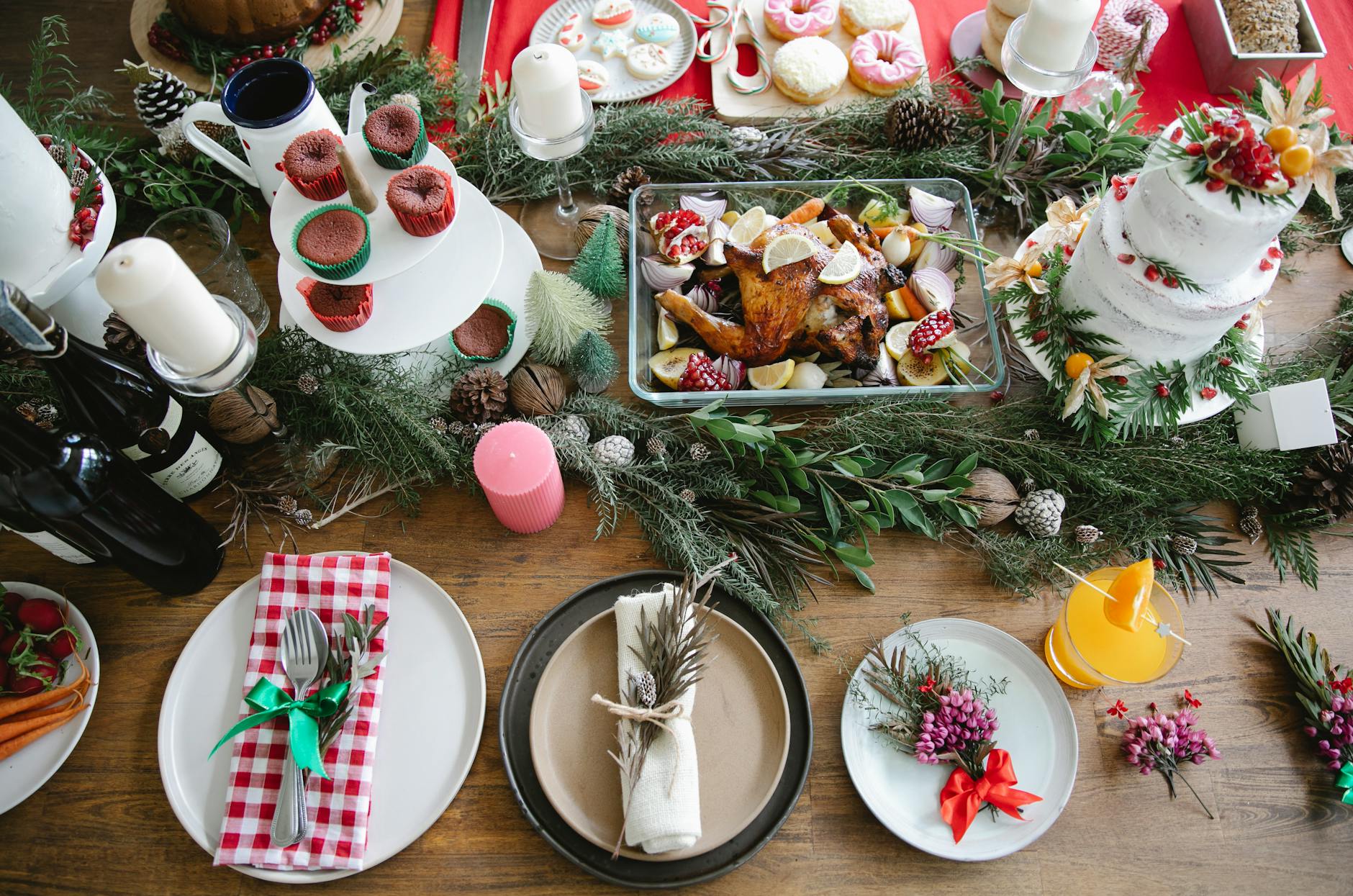 Delicious Christmas dinner on table with dessert and turkey · Free