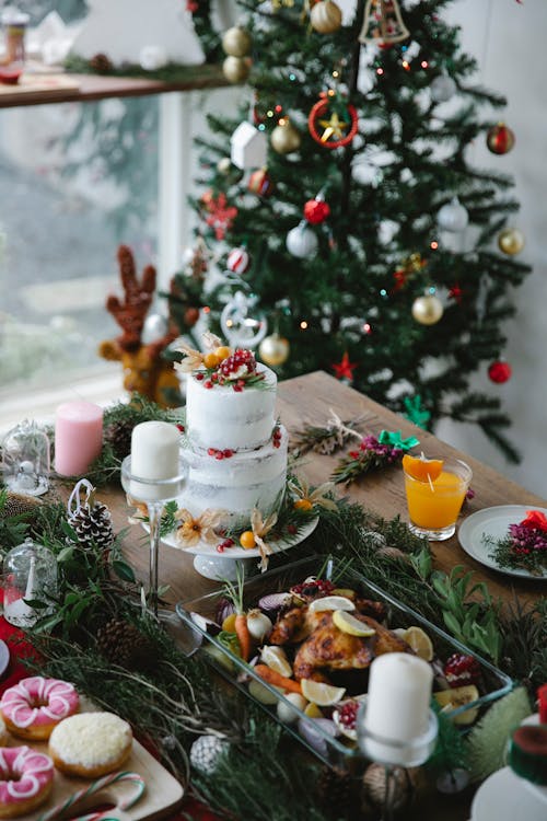 Table for Christmas with cake and decorations