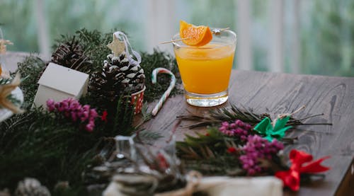 Glass of fresh cocktail placed on festive table