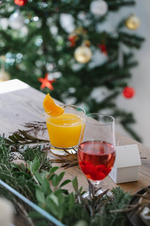 Festive table with glasses of colorful beverages