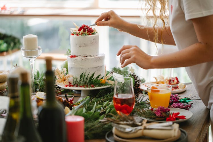 Crop Woman Chef Decorating Cake