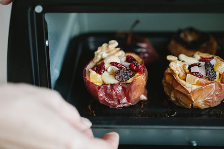 Crop Cook Getting Out Tasty Filled Baked Apples Of Oven