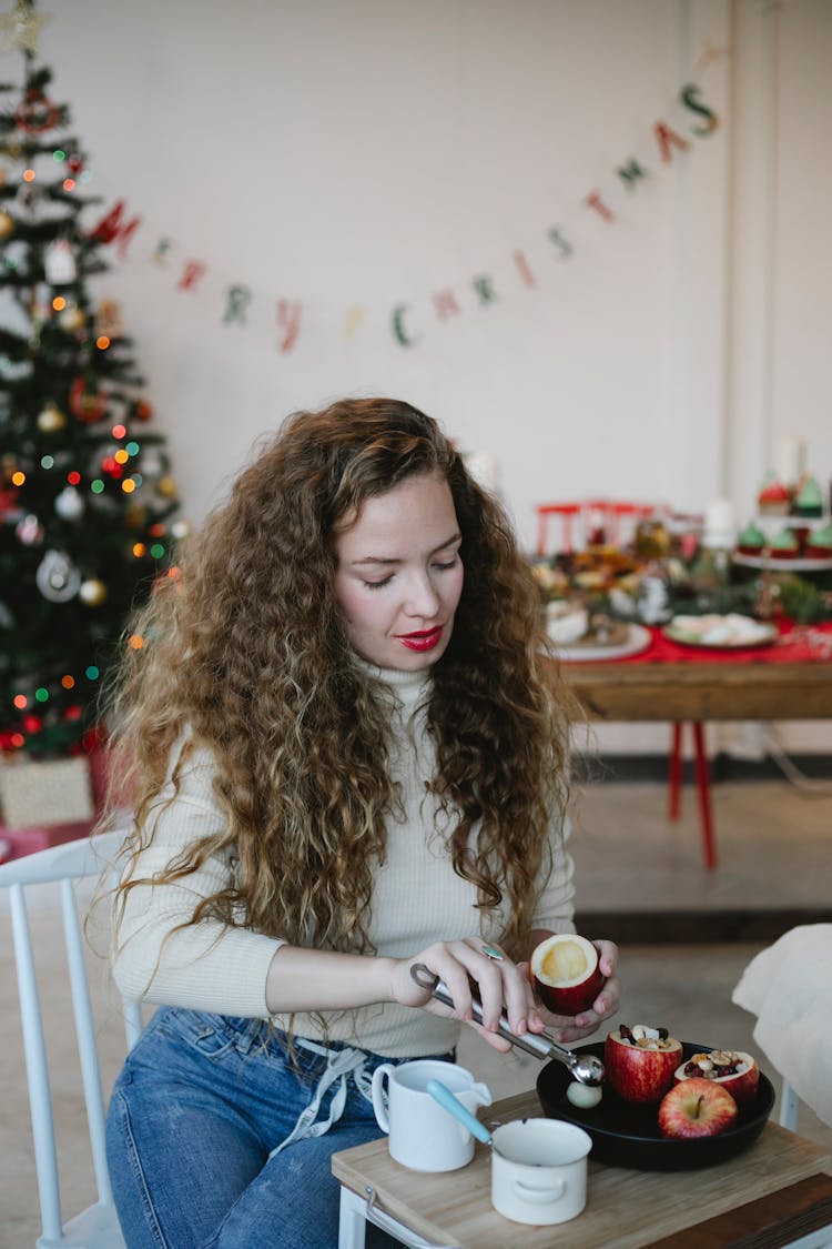 Chef Filling Apple While Cooking During Christmas Holiday