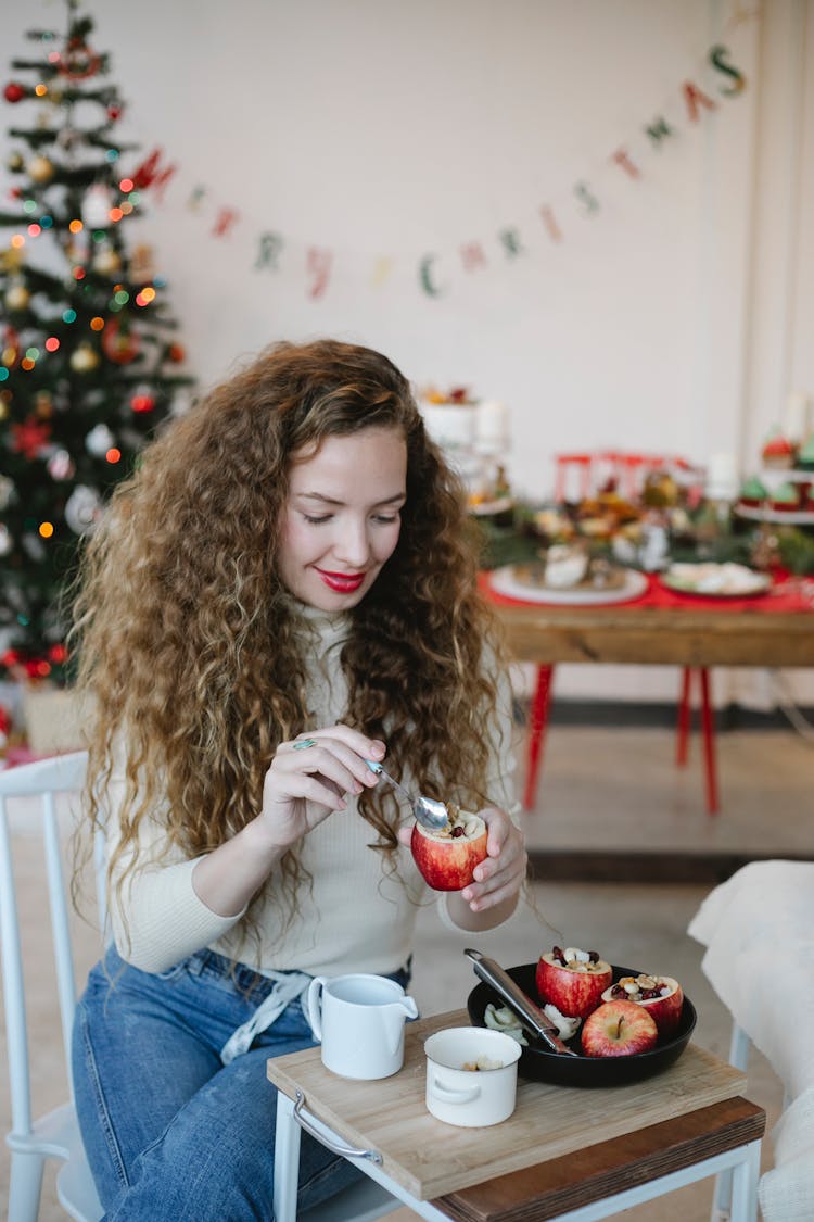 Smiling Chef Stuffing Apple For New Year Holiday In House