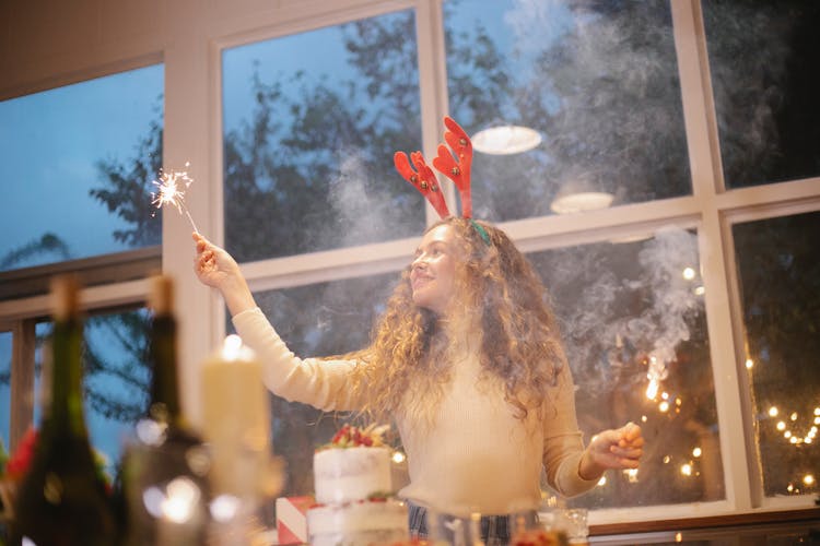 Cheerful Cook With Burning Bengal Light Celebrating Christmas Holiday Indoors