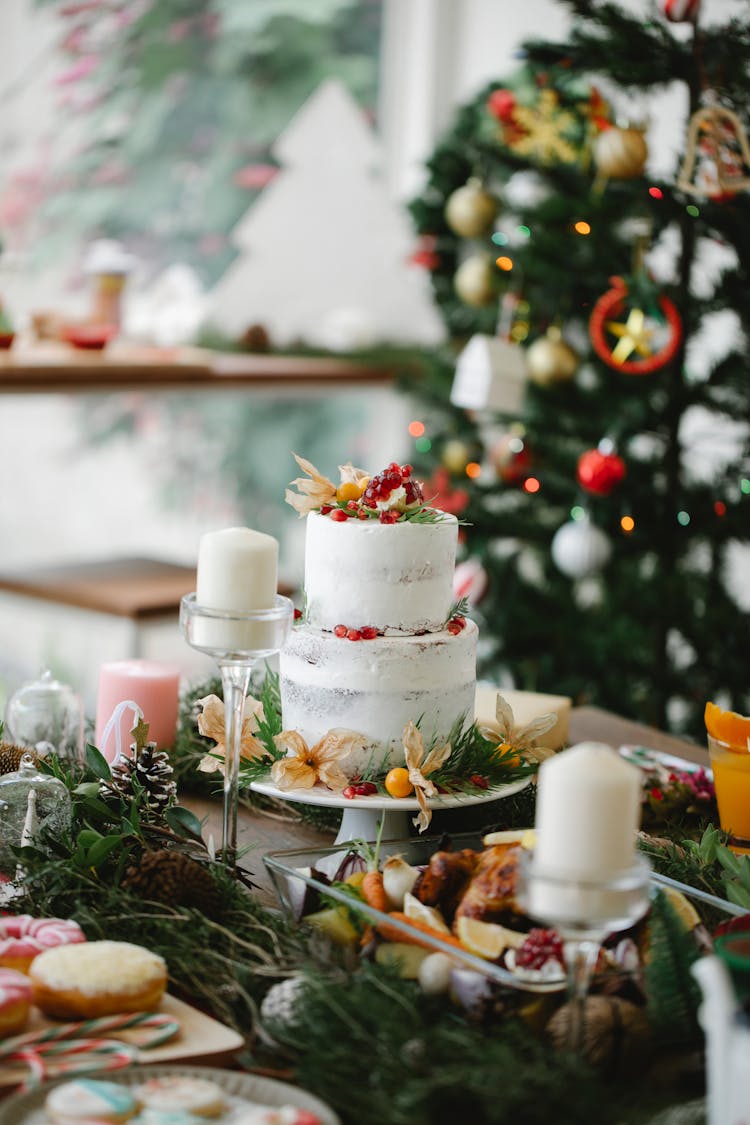 Table Setting For Christmas Dinner Near Fir Tree