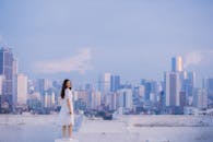 Pretty Woman Standing on the Rooftop