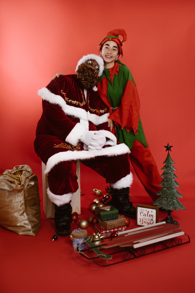 A Person Wearing Santa And Elf Costume