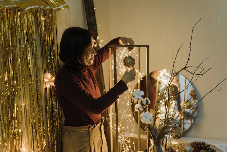 Woman Making Christmas Decorations