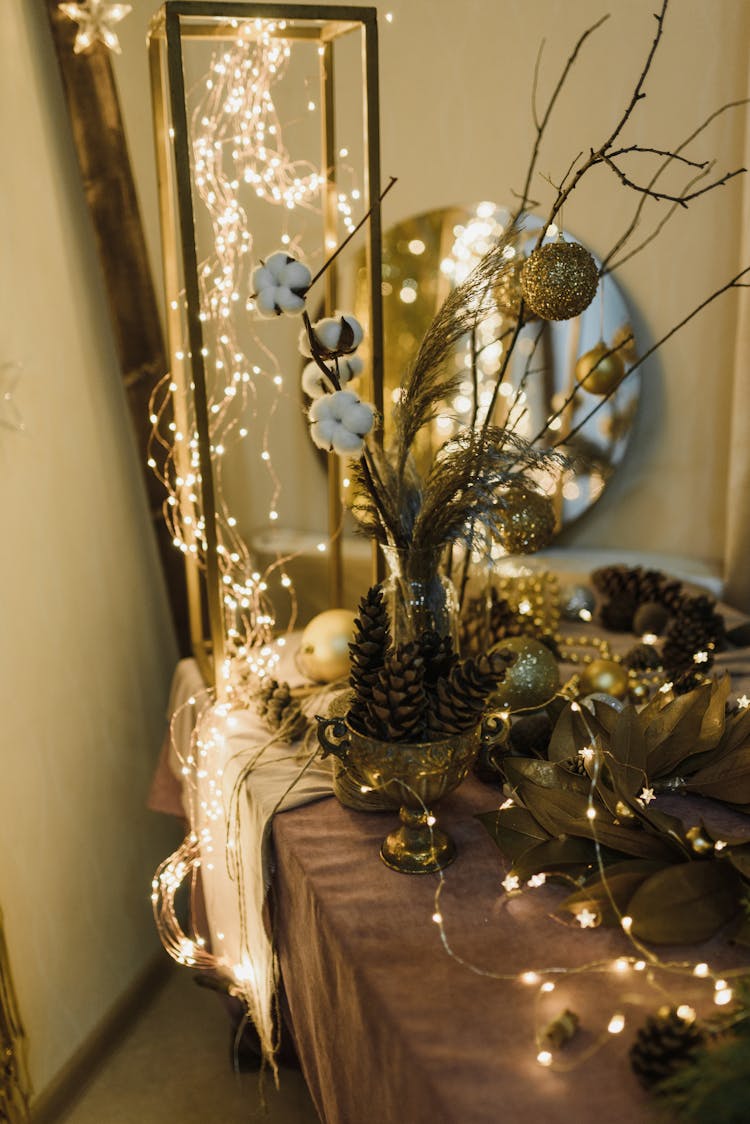 Christmas Decorations Arranged On A Table