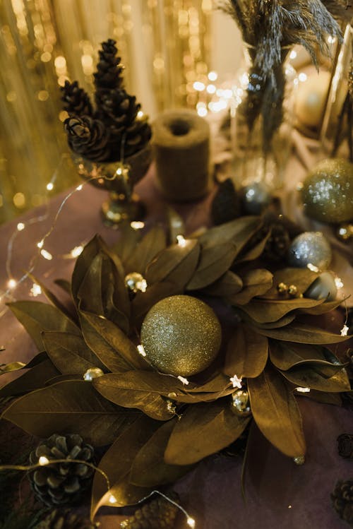 Gold Bauble on Dried Leaves Christmas Decoration 