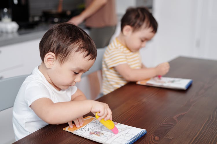 Two Little Boys Drawing 