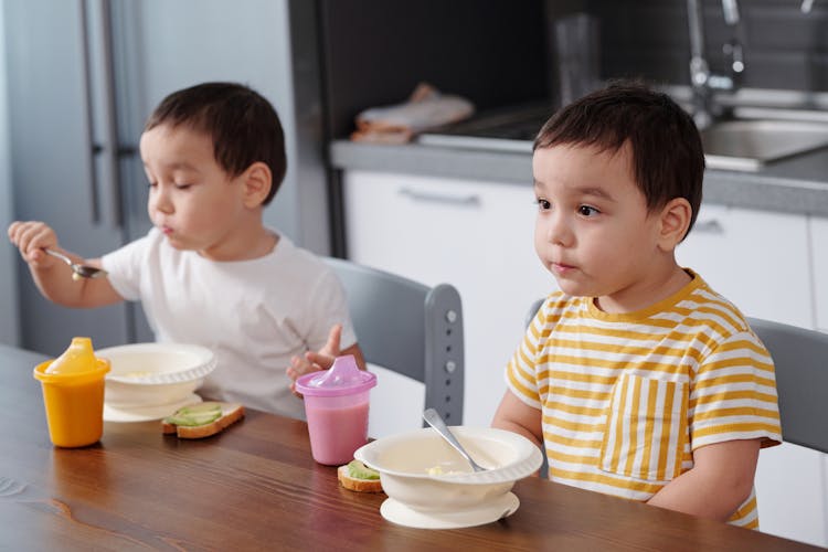 Twins Eating Breakfast