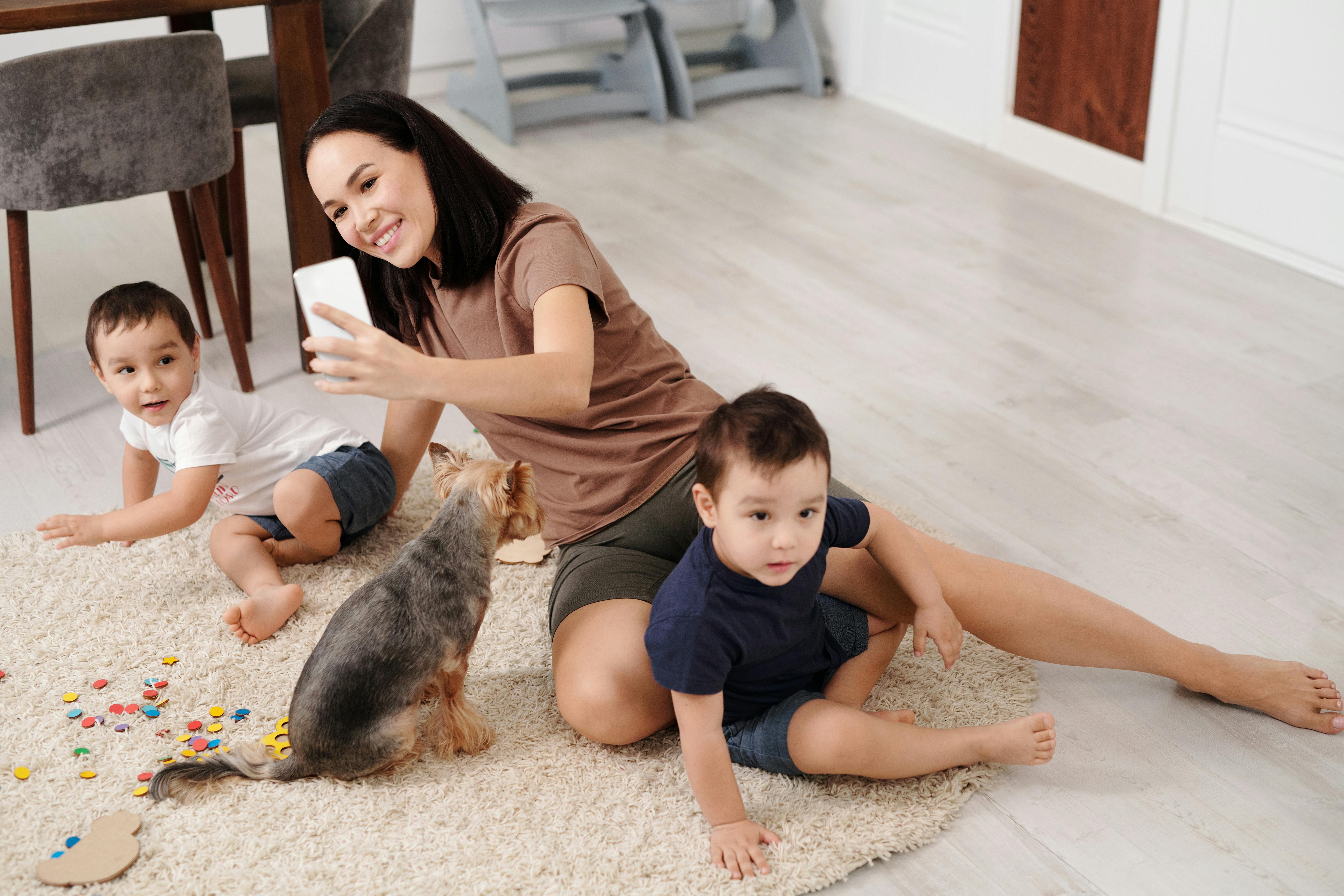 Mother and Her Children Playing at the Kitchen