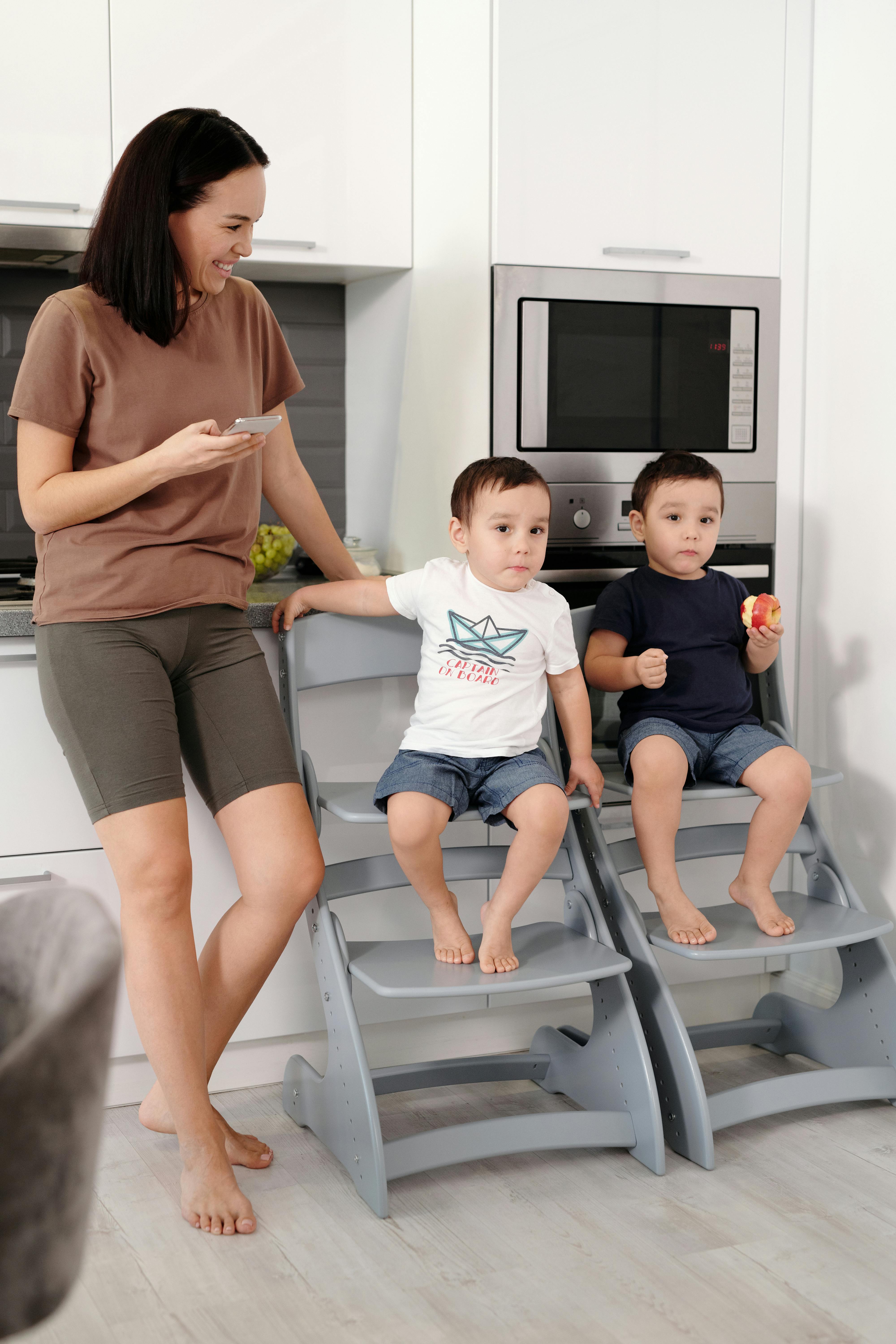 mother in the kitchen with her little boys