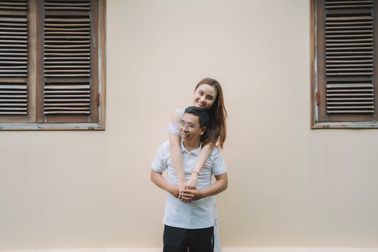 Happy Young Couple Having Fun Together On Street