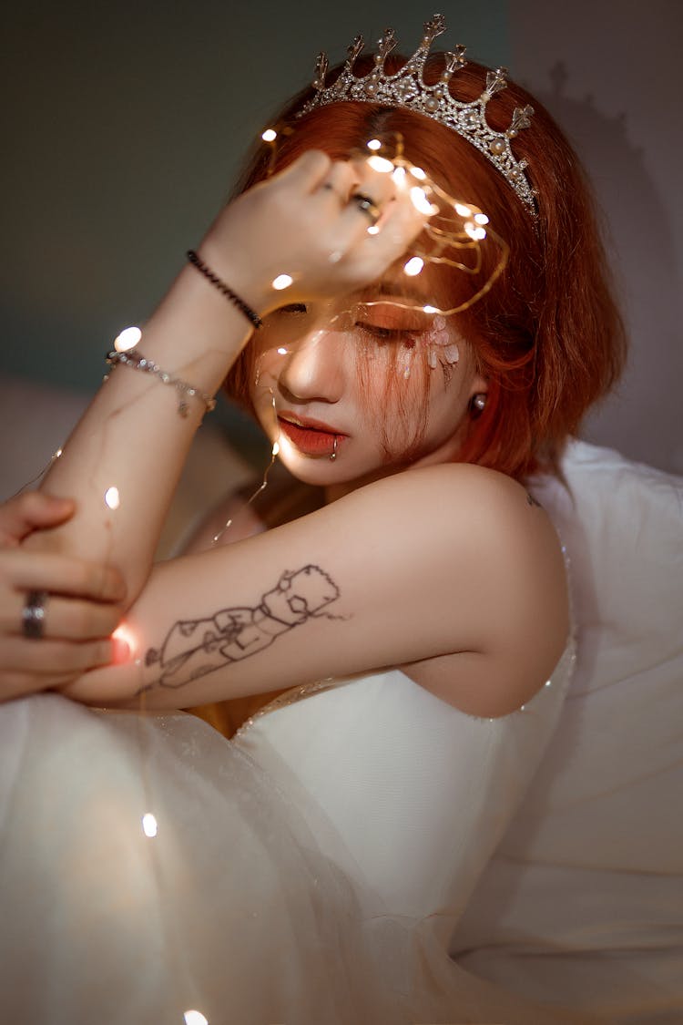 Asian Bride With Glowing Garland On Wedding Day At Home