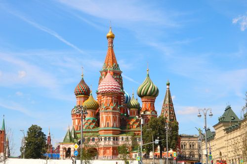 Free Iconic image of St. Basil's Cathedral with colorful domes in vibrant Moscow, Russia under a clear sky. Stock Photo