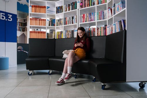 A Teenager Using Her Smartphone