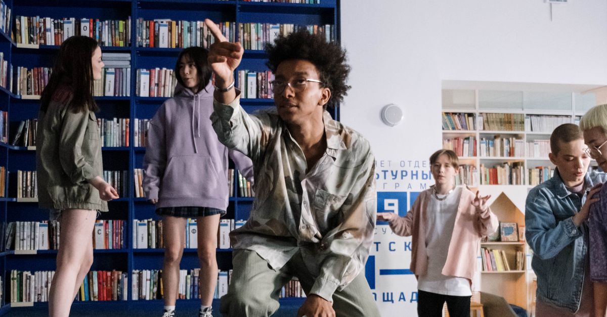 Humans In Library People Standing inside the Library · Free Stock Photo
