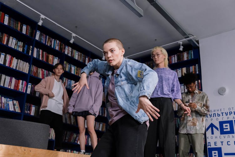 Girl Posing In A Library 