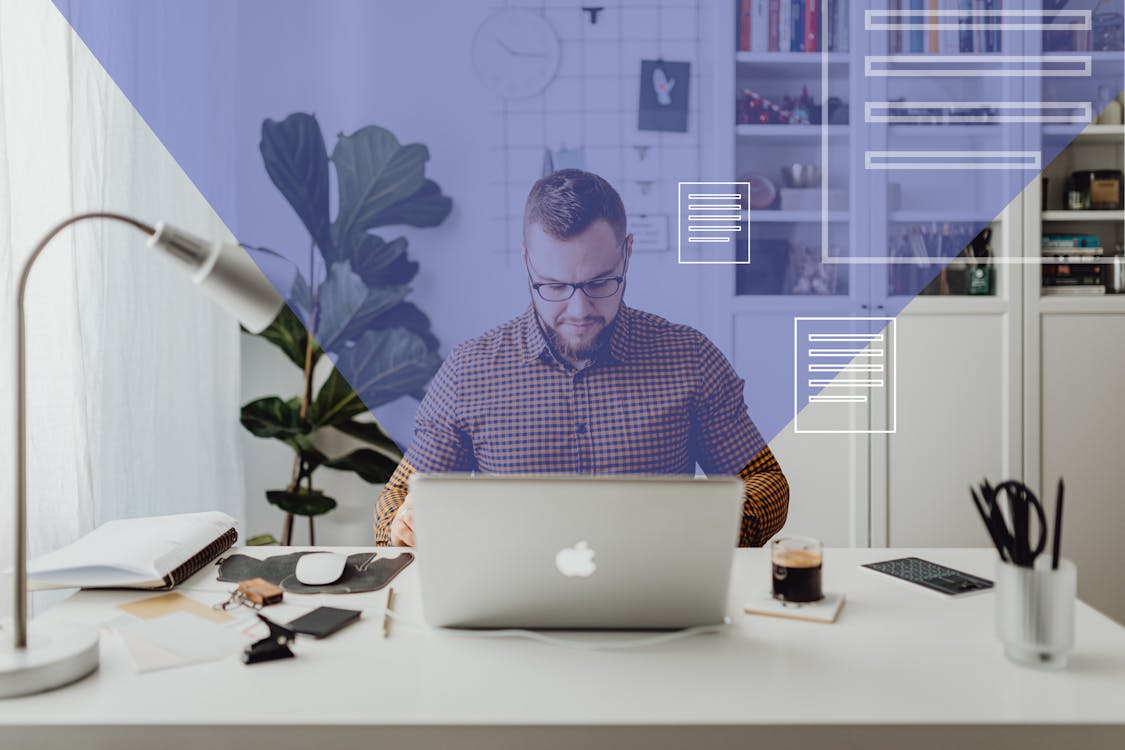 Free Man in Blue and White Checkered Dress Shirt Using Silver Macbook Stock Photo