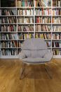 A Gray Padded Chair in the Library