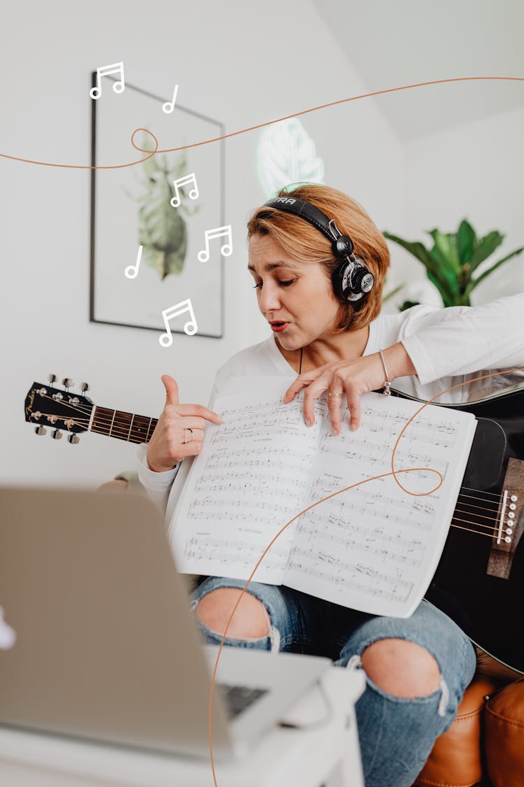 Woman With Guitar And Music Notes