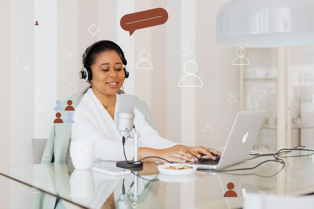 Black woman podcasting from home using a laptop and microphone. Cover image for HotelNext podcast episode 16.