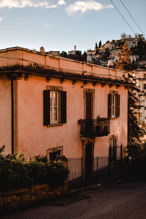 Free Charming villa in Bergamo, Italy at sunset with picturesque hillside view. Stock Photo
