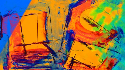 Free Dynamic abstract artwork featuring vivid blues, oranges, and greens. Stock Photo