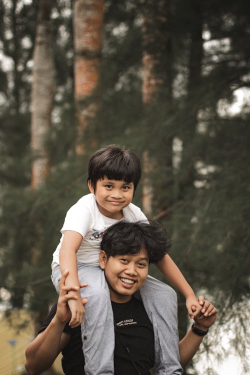 Free Father and Son Smiling at the Camera Stock Photo
