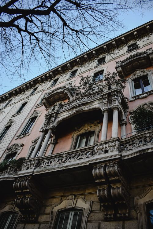 Free A detailed view of a classical architectural facade in Milan, Italy. Stock Photo