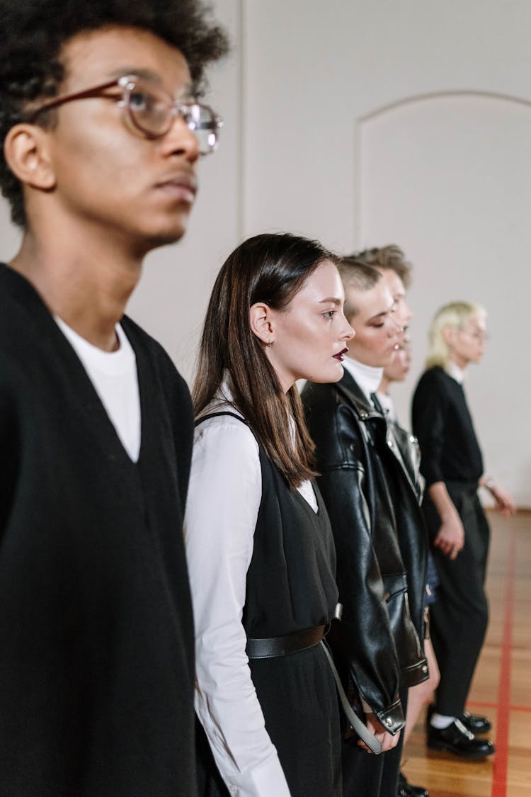 A Group Of Students Standing In The Gym