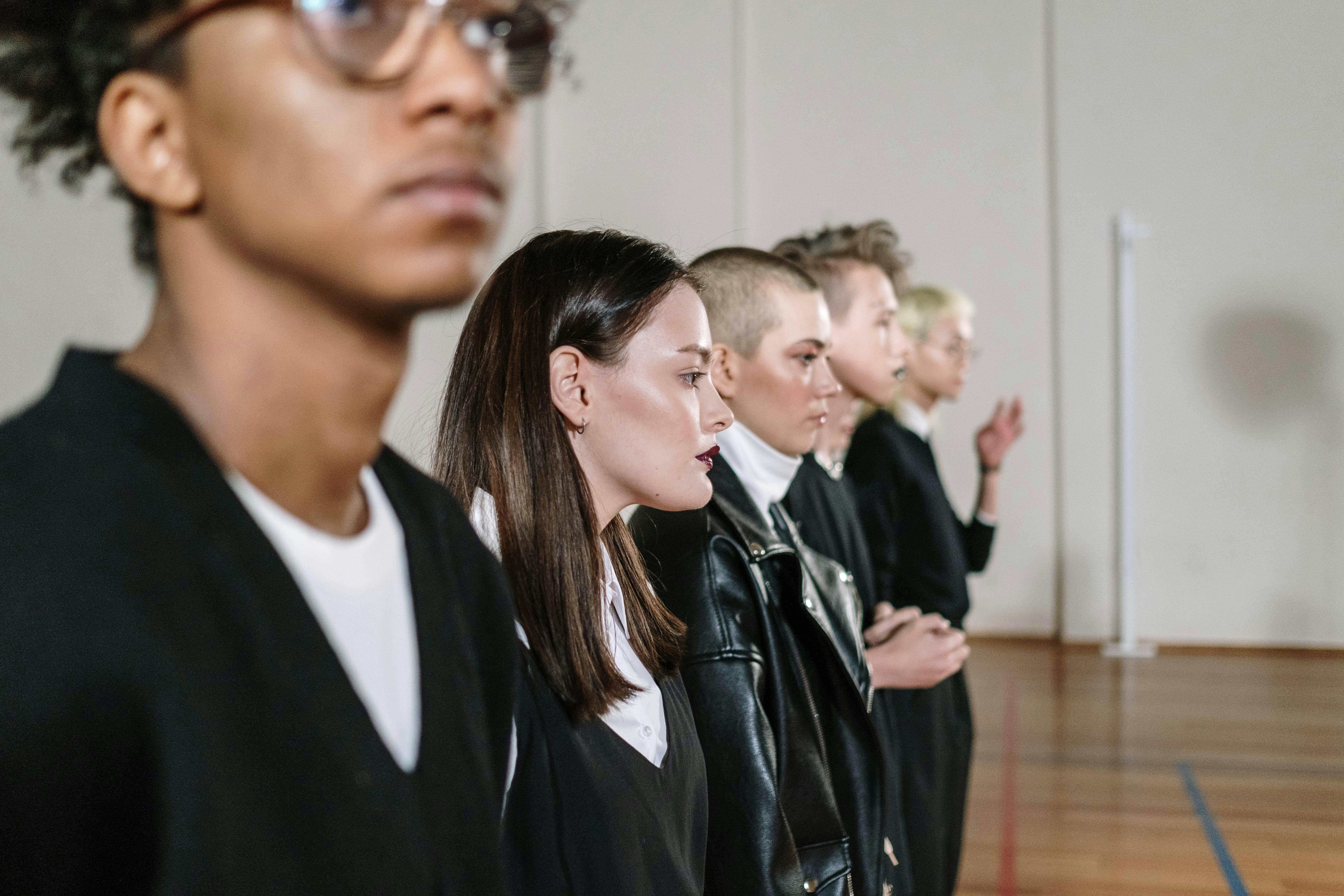 a group of students standing in the gym