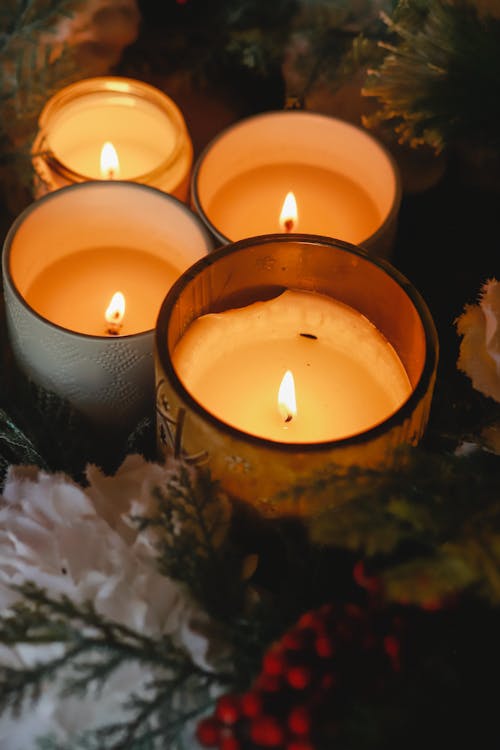 Free Burning Candles in Close Up Photography Stock Photo