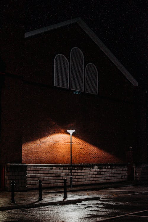 Illuminated Street During Night Time