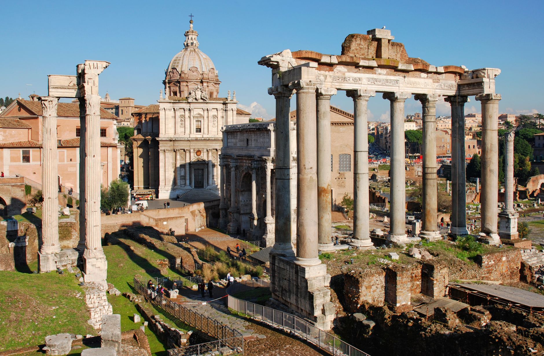 Explore the historic Roman Forum in Rome, showcasing iconic ancient ruins and architecture.