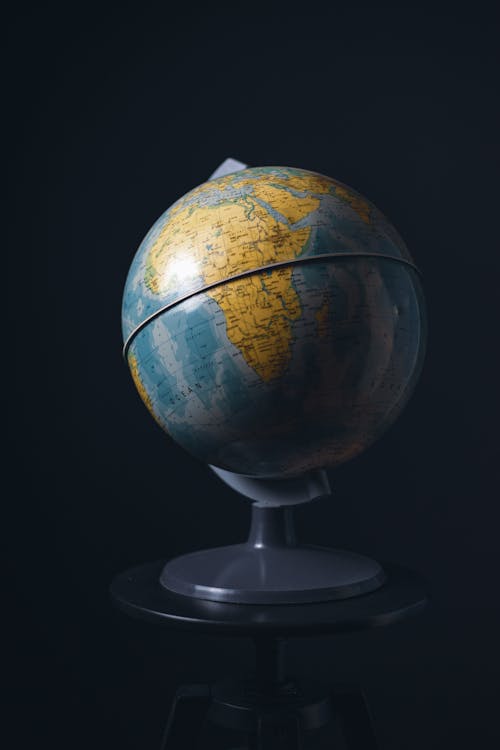 Photo of a Globe against Black Background 