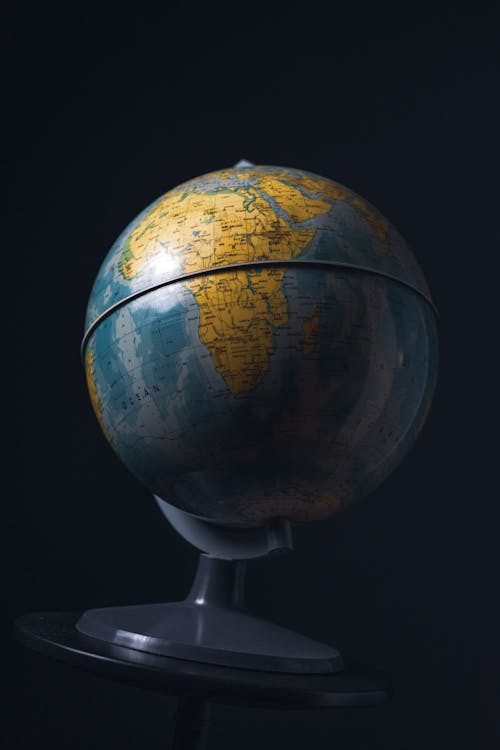 Free Globe On Stand With Black Background Stock Photo