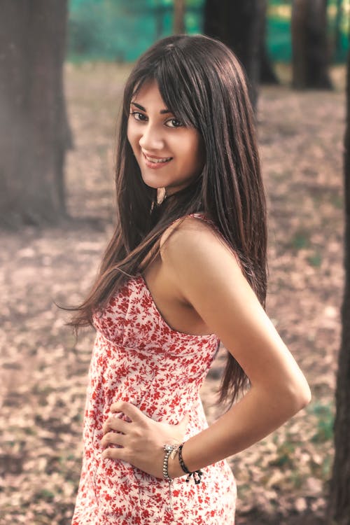 Close-Up Shot of a Woman Wearing a Floral Dress